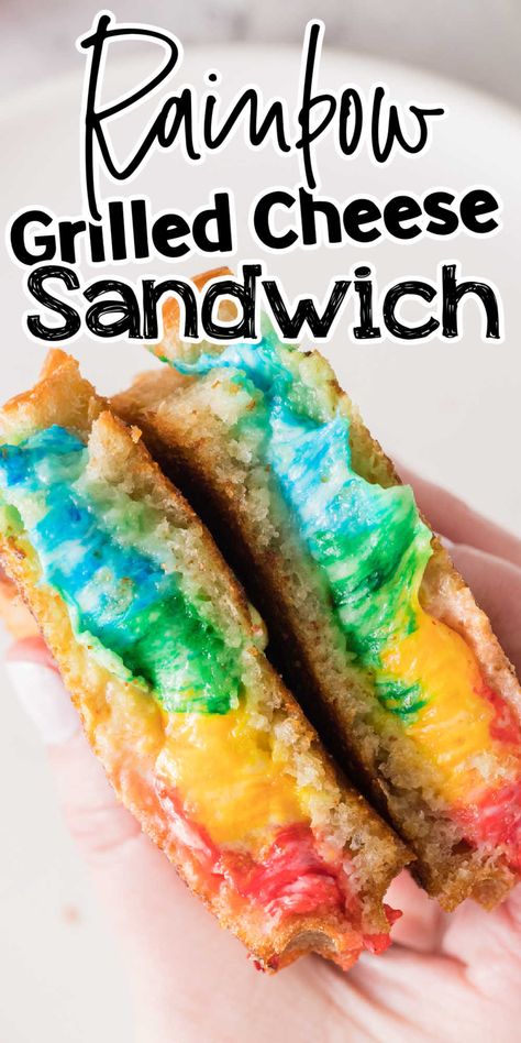 Comfort food with a fun twist, this rainbow grilled cheese sandwich recipe is a regular grilled cheese with a twist and it is perfect for the kids. Melty cheese that is brightly colored with toasty bread. The whole family is going to love this rainbow sandwich recipe! Weather you are looking to put a smile on your Unicorn lovers face or a fun and easy St. Patrick's Day meal idea, this fun recipe is perfect for you! Rainbow Mac And Cheese, Rainbow Veggie Sandwich, Rainbow Toast, Gourmet Grilled Cheese Sandwich Recipes, Rainbow Grilled Cheese Sandwich, Homemade Grilled Cheese, Rainbow Grilled Cheese, Grill Cheese Sandwich Recipes, Cheese Sandwich Recipes