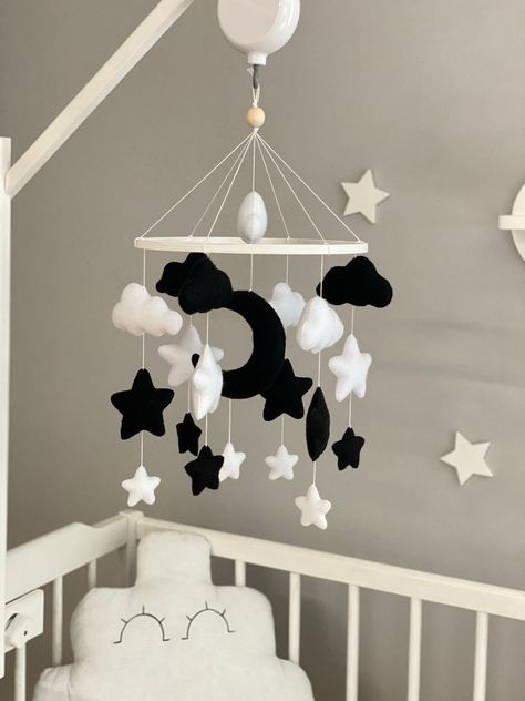 This Black and White Baby Mobile Stylish and cozy mobile for newborn, boho style is very popular in nursery decor and this mobile will be a great addition. Crib mobile is great present for newborn,on baby shower or baptism.  ♥SAFE TOYS YOUR BABY♥ Non-toxic natural wool felt * The size. The diameter of the ring is 24 cm. ( 9.4 in. ) Full length ~ 40-45 cm ( ~ 15.7-17 inches) * Materials. Beech - for a mobile hoop, hypoallergenic Korean felt, hollofayber -hypoallergenic toy filler, strong cotton t Black And White Baby Nursery, Lunar Nursery Theme, Black And White Nursery, Baby Boy Nursery Stars, Black And White Moon And Stars Nursery, Grey Moon And Stars Nursery, Night Nursery, Black Nursery, Stars Baby Mobile