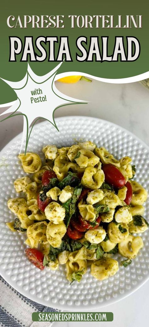 Caprese tortellini pasta salad with pesto is a fresh take on pesto pasta salad. Pillowy cheese tortellini gets tossed with lemon pesto, sweet cherry tomatoes, fragrant basil, and creamy mozzarella for a delicious cold pasta dish you'll love! #pasta #pastasalad #tortellini #tortellinipastasalad #caprese #pesto #recipe