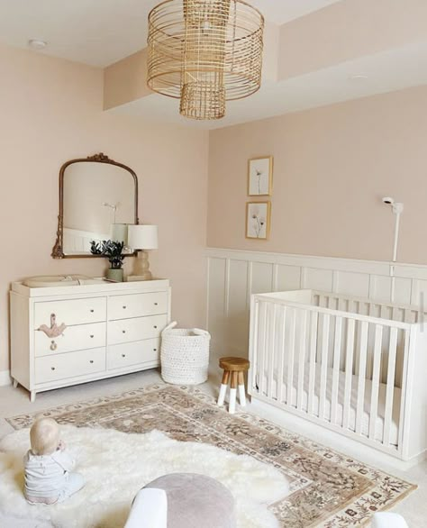 Blush Pink Nursery Walls, Pale Peach Nursery, Light Peach Nursery, Sashay Sand Sherwin Williams Nursery, Nursery With Pink Walls, Pink White Natural Wood Nursery, Blush And Cream Nursery, Unconventional Nursery Ideas, Blush Pink And Gold Nursery