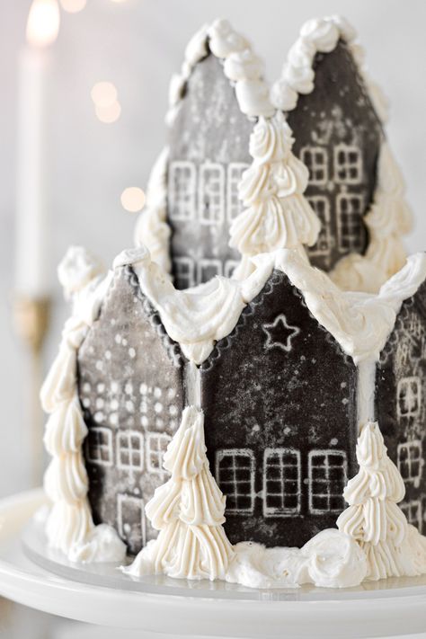 Make your own gingerbread village cake for Christmas by pressing iced chocolate shortbread house cookies around a cake, and decorating with vanilla buttercream Christmas trees and swirling snow drifts. This makes a fun holiday baking project for a snowy weekend at home! Iced Chocolate, Christmas Cookie Box, Chocolate Shortbread, Chocolate Shortbread Cookies, Champagne Cake, Snowman Cake, Delicious Christmas Cookies, Gingerbread Village, Winter Cake