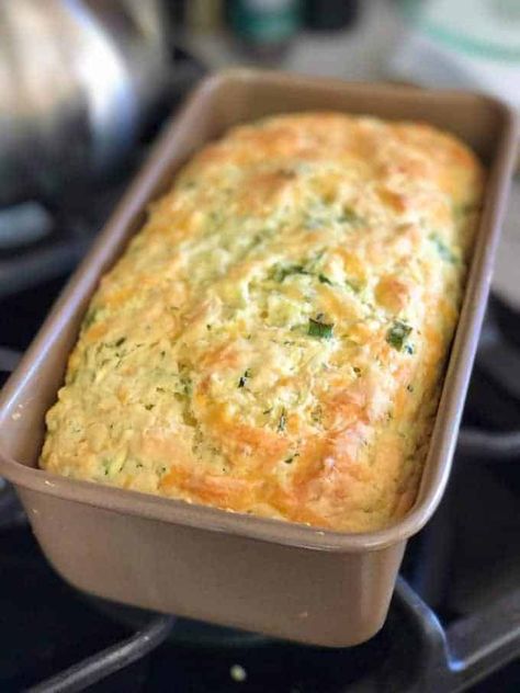 This Savory Zucchini Quick Bread requires no yeast or rise time or buttermilk! It is our favorite quick bread recipe! #quickbread #zucchinirecipes #savoryquickbread #easybread #cheddarquickbread #cheeseyzucchinibread Zucchini And Cheese Bread, Zucchini Herb Cheese Bread, Midnight At The Blackbird Cafe Recipes, Grated Zucchini Recipes, Savory Zucchini Bread, Zucchini Cheddar, Bread Quick, Zucchini Cheese, Muffin Bread