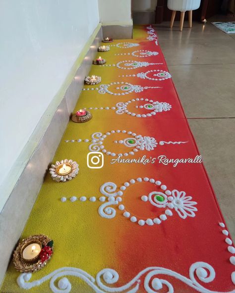 "Discover elegant and simple Rangoli designs that will beautifully enhance and elevate the ambiance of your special occasion. #RangoliDesigns #ElegantDecor #FestiveVibes #TraditionalArt #OccasionDecor #BeautifulRangoli" Bela Rangoli Design, Border Diwali Rangoli, Elegant Rangoli Designs, Boundary Rangoli Design, Diwali Border Rangoli, Rangoli Corner Design, Corner Rangoli Designs Diwali, Rangoli Designs Corner, Traditional Rangoli Designs Beautiful