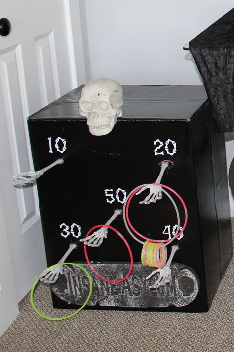 Michael’s Halloween Crafts, Diy Cardboard Halloween Games, Halloween Trick Or Treat Ideas At Home, Skeleton Ring Toss, Carnevil Halloween Party Games, Kids Halloween Carnival Games, Shoot The Skeleton Game, Kid Games For Halloween Party, Halloween Whats In The Box Game