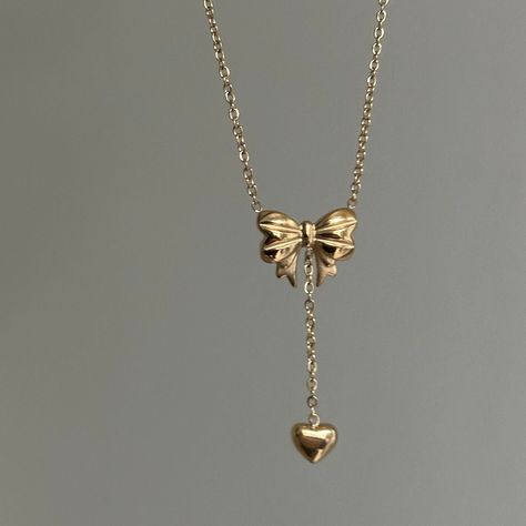 Bow Drop Heart Necklace  ✨ Fully stainless steel & tarnish proof! (18k gold plated/stainless steel) 15.5" with a 2" extender  oval link chain style featuring a unique mini puffed bow pendant & mini heart pendant 🤍 choose between silver or gold at checkout 😊 Handmade with love! K Jewelry, Jewelry Accessories Gold, Cute Heart Necklace, Jelewry Gold, Gold Necklace With Heart Pendant, Pretty Jewellery Gold, T Necklace, Dainty Jewellery, Heart Shaped Locket