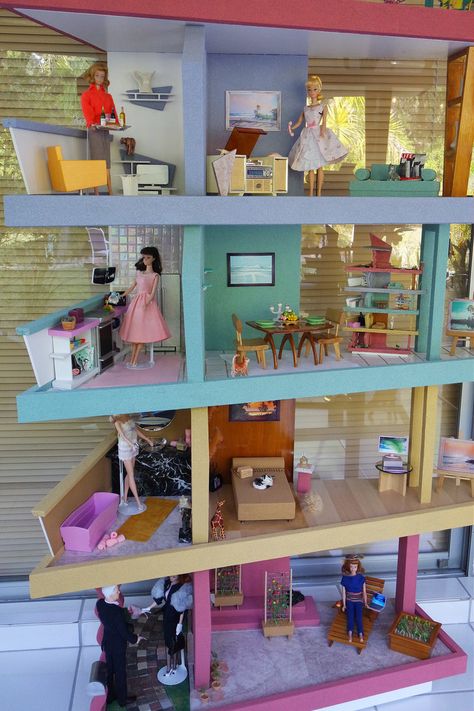 updated mod Barbie house photos Barbie House Diy, Wooden Barbie House, Homemade Barbie House, Retro Dollhouse, Best Doll House, Barbie Organization, Barbie Houses, Mod Barbie, Barbie Dollhouse