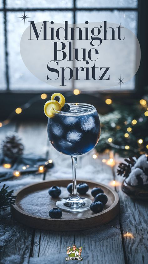 "Discover the vibrant Midnight Blue Spritz Cocktail, a sparkling blue drink perfect for parties! This elegant blue spritz drink combines the refreshing flavors of blue curaçao and Aperol, creating a stunning nighttime blue spritz that's sure to impress. Perfect for gatherings or a cozy night in, this Midnight Blue Cocktail is a must-try. Elevate your cocktail game with this easy Blue Spritz Drink Recipe and enjoy the delightful taste of summer in every sip!" Alcoholic Drinks Blue, Blue Cocktail Aesthetic, Acotar Cocktails, Hanukkah Cocktails, Blue Drinks Alcohol, Blue Cocktail Drinks, Celestial Cocktails, Blue Mocktail Recipe, Chanukah Cocktails