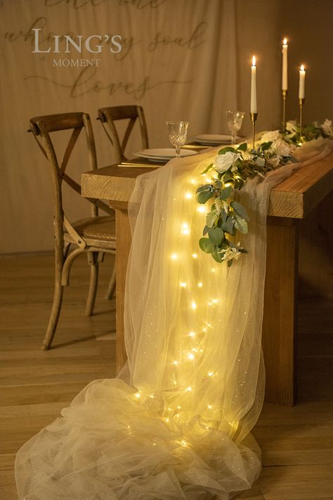 Fairy Lights Under Cheesecloth, Tulle Table Runner With Lights, Tulle Eucalyptus Table, Fairy Lights Table Runner, Square Cocktail Table Wedding, Tulle Decor Ideas, Tule Table Runner, Tulle Ideas Decoration, Bridal Shower Dinner Table Decor