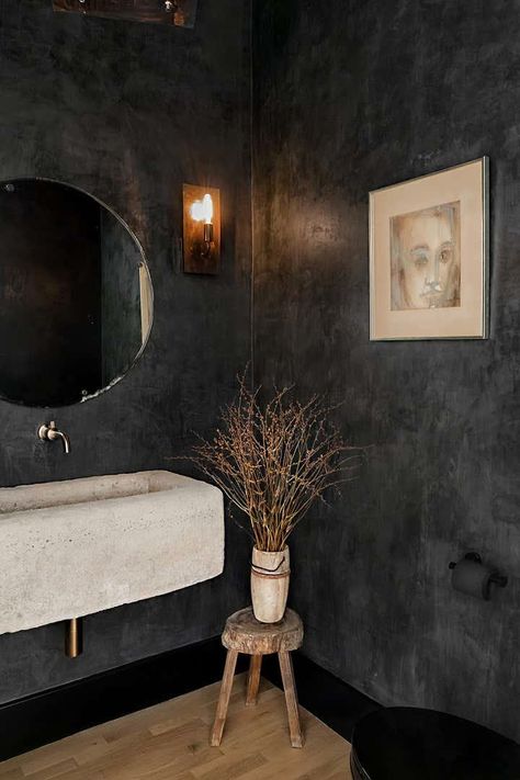 Moody Green Bathroom Cabinets, Dark Powder Room Ideas Luxe, Minimalist Half Bathroom, Unique Half Bath, Stone Sink Bathroom, Moody Powder Room, Black Powder Room, Downstairs Wc, Limewash Walls