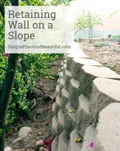 DIY Retaining Wall : How to make gardening on a hill easier How To Retaining Wall, How To Landscape A Hill, Retaining Wall On A Slope, Small Retaining Wall, Diy Retaining Wall, Backyard Retaining Walls, Building A Retaining Wall, Yard Makeover, Landscaping A Slope