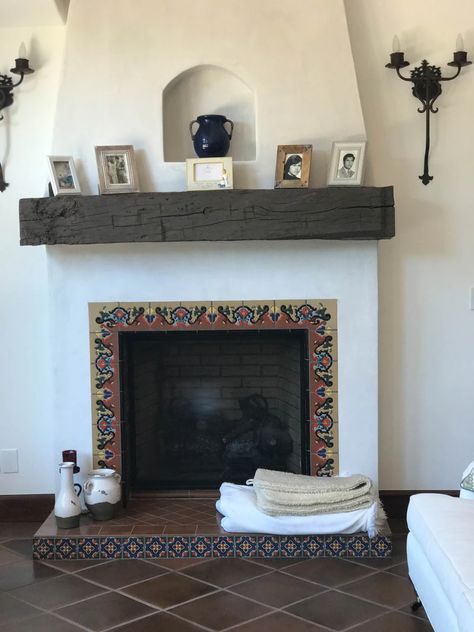 Fireplace Ideas Spanish Style, Spanish Inspired Fireplace, Mexican Tile Fireplace Surround, Fireplace Makeover Spanish Style, Saltillo Tile Fireplace, Spanish Stone Fireplace, Fireplace With Spanish Tile, Fireplace Tile Edge, Hacienda Fireplace Ideas