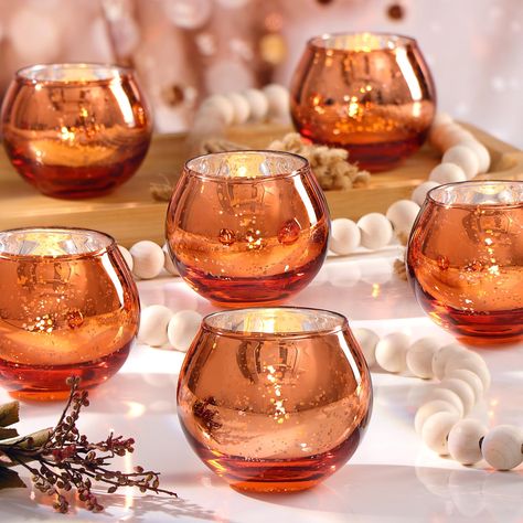 PRICES MAY VARY. Mercury Glass Votives: Illuminate your space and immerse yourself in the warm glow of our 24pcs burnt orange candle holders. These candle holders, with their vibrant color and elegant inner mercury coating design, have the ability to glitter and cast incredibly beautiful projections on your tabletop in the darkness. Let their presence light up your gatherings and create an immersive experience for all. Ideal Fall Party Decor: Our carefully selected 24 Pcs Brand New Burnt Orange Orange Candle Holder, Thanksgiving Table Centerpieces, Terracotta Decor, Fall Wedding Tables, Glass Tealight Candle Holders, Fall Table Centerpieces, Unique Candle Holders, Glass Votives, Orange Candle