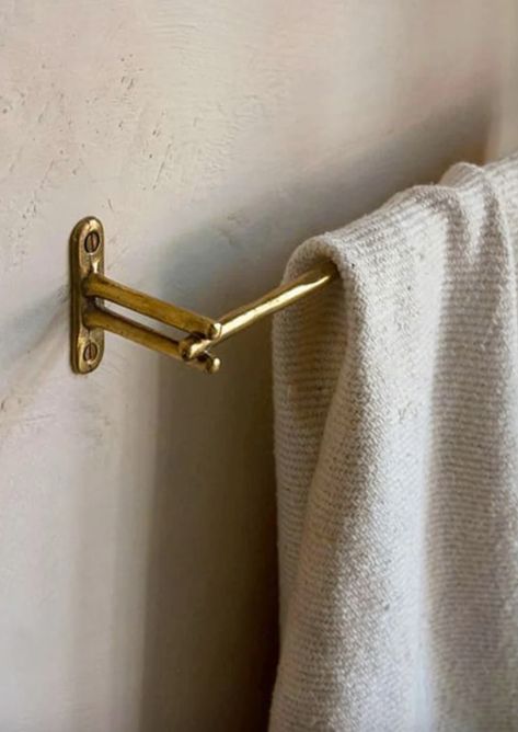 Designed as a jewel for the house, each piece is sculpted by hand before being cast in brass. The raw molded surface retaining any texture makes the object unique. The hand towel holder can be functional for the tea towels in the kitchen, or as a hand towel in any bathroom, powder room, or ensuite. Dimensions: 18"L x 3" Materials: Solid Unlaquered Brass, Natural Brass Finish. *Durable and rustproof. Allow to patina over time, or use a brass copper brightener with no abrasive cloth. (Wall mounting screws included.) IN STOCK please note: for shipping & returns please review our Shipping & Return Policy Brass Bathroom Hardware, Chrome Towel Bar, Brass Towel Bar, Bronze Bathroom, Towel Rod, Paris Chic, Brass Bathroom, Bar Ring, Bathroom Towel Bar