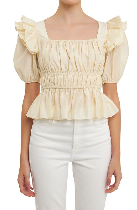 Shirring at the waist creates elegant shape on this puff-sleeve blouse crafted with frothy ruffles at the shoulders for dramatic flair. Square neck   Short sleeves   Lined   85% Tencel® lyocell, 15% polyester   Tencel lyocell is a sustainably produced fiber made with closed-loop processing   Hand wash, dry flat   Imported Blouse Ruffle Sleeve, Luxury Blouse, History Bounding, Shirred Top, Puff Sleeve Crop Top, Corset Crop Top, Peplum Hem, Puff Sleeve Blouse, Ruffled Sleeve Top