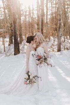 Okay this cozy winter wedding inspiration has turned the heat up on neutrals! Wheat rust and onyx never looked so good. And when you see the drippy chocolate naked cake you will understand why. These two brides are bringing style to the table which speaking of is decked out with an epic floral installation any couple would dream about. Head over to #ruffledblog to admire it all!  Okay this cozy winter wedding inspiration has turned the heat up on neutrals! Wheat rust and onyx never looked so goo Sapphic Wedding, Ballerina Wedding Dress, Whimsical Wedding Gown, Bridal Pantsuit, Moody Palette, Ballroom Wedding Dresses, Vintage Inspired Wedding Gown, Floral Installation, Two Brides