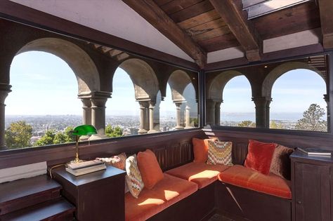 The storied Hume Castle in Berkeley hit the market at $5 million in April 2016. Built in the style of a 13th century French monastery, this magnificent home looks as if it belongs perched on a European hillside. Photo: Liz_Rusby, Liz Rusby Gothic Arches, Berkeley Hills, Stone Archway, French Castle, Mediterranean Style Home, French Castles, Wrought Iron Chandeliers, Fabulous Kitchens, Wooden Beams