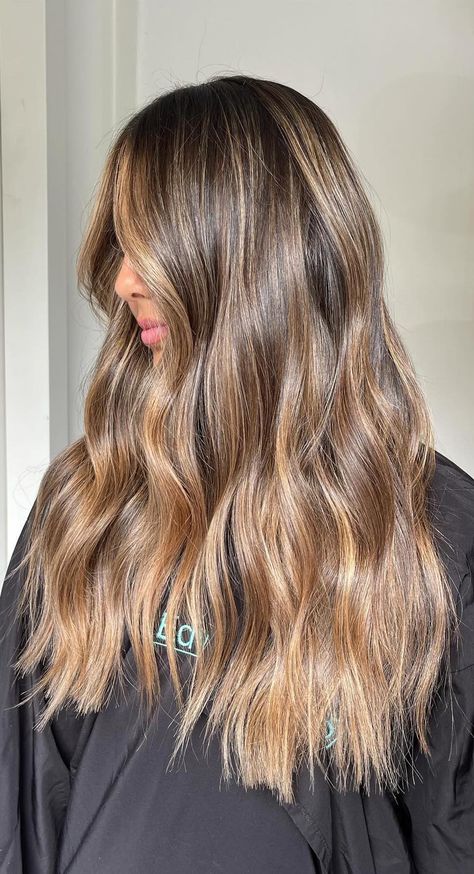 Book your refresh in today! #brondebalayage #blondehairwithdarkroots #brondelivedinhair #balayagehair #brondehaircolourideas #haircolourideas #brunettehairhighlights #softbronde #ashybronde #sunkissedhair #warmbalayage Honey Beige Balayage Brunette, Brown Hair Colors Dark Roots, Honey Brown Hair With Dark Roots, Golden Bayalage On Dark Hair, Lightning Brown Hair, Bronze Blonde Balayage, Full Head Balayage Brunettes, Bronde Caramel Balayage, Brown Balayage Asian Hair