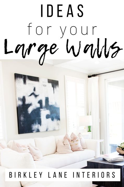 Do you have a big, blank wall you don’t know how to decorate? Check out 12 affordable large wall decor ideas that are amazing solutions for your living room, bedroom and more! Decorate Big Wall Space, Off Center Wall Art, Wall Art Loving Room, Colourful Wall Art Living Room, Large Great Room Wall Decor Ideas, Home Decor With White Walls, Large Pictures For Dining Room Wall, Grand Room Decor, Extra Large Wall Art Dining Room