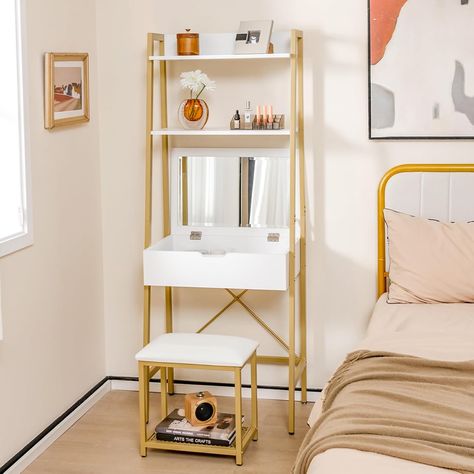 Price: $249.99
Color: White + Gold
Size: Small
Material: Engineered Wood, Metal
Dimensions: 39.5D x 60W x 164.5H cm
Features: Flip-up mirror, 2-tier shelves, 4 storage compartments, cushioned stool, anti-tipping device, compact design.
Brand: COSTWAY
Weight: 52.5 lbs
Assembly Required: Yes Bedroom White Gold, Dressing Table For Small Space, Small Makeup Vanity, Small Spaces Bedroom, Small Makeup Vanities, Vanity Dressing Table, Vanity Benches, Bedroom White, Small Vanity