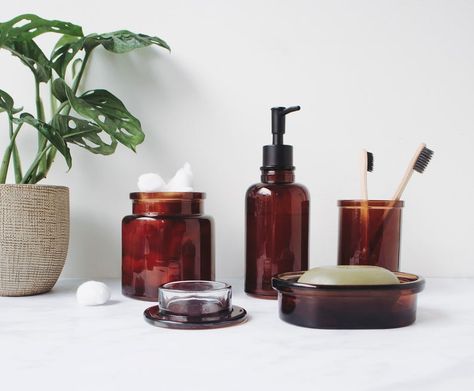 Amber Glass Bathroom, Wax Studio, Glass Bathroom Accessories, Bathroom Tumbler, Bathroom Oasis, Glass Soap Dispenser, Bathroom Design Trends, Jar Design, Farmhouse Master