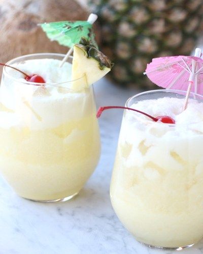 2 glasses of pina colada party punch Pina Colada Punch Recipe, Pina Colada Punch, Backyard Luau, Punch Recipes For Kids, Party Punch Recipe, Easy Party Punch, Spiked Lemonade, Alcoholic Punch Recipes, Non Alcoholic Punch