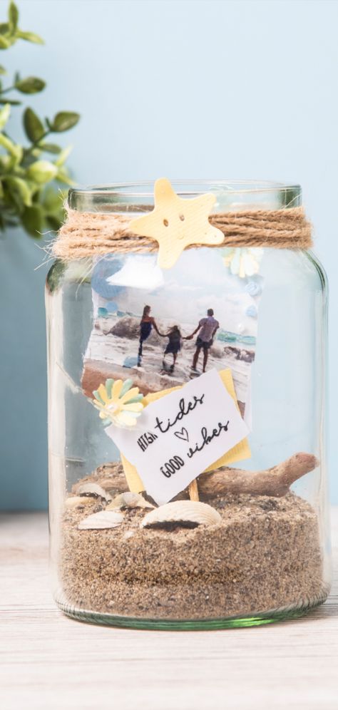 Turn your precious holiday memories into a home décor piece with a memory jar! ☀🌴🌊 Feature your make using #mymakingstory #sizzix #memoryjar #diymemoryjar #holidaymemories #holidayphotos #photostorageideas #photodisplayideas #homedecor #homedecorideas Beach Memory Jars, Beach Jar, Memory Jars, Memory Jar, Graduation Party Centerpieces, Vacation Memories, Jar Diy, Beach Crafts, Graduation Decorations