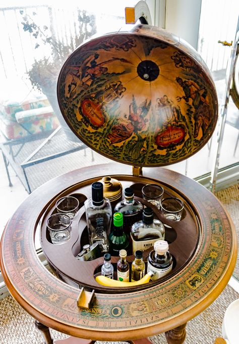 Globe Bar Cart, Mid Century Modern Glam, Modern Glam Decor, Eclectic Glam, Chicago Condos, Globe Bar, Green Chairs, Old Globe, Glam Design