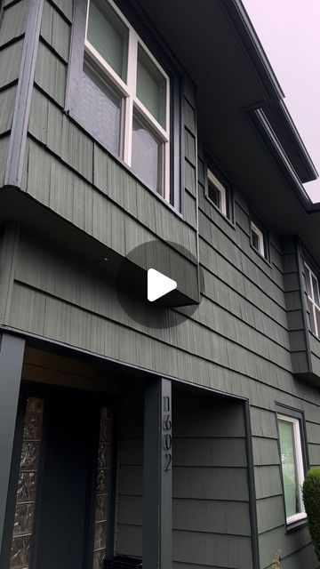 Julia-Grace Sanders Stenfjord on Instagram: "Miss dark and moody herself 🫦 

The new exterior color was showing off yesterday in its natural habitat (rain). It looks a bit darker in person, and different at every time of day, but we love her in all lighting. Shout out to my boy Ben at the Edmonds Sherwin Williams for the many many samples to get this custom color exactly right 🤌🏻

#darkgreenexterior #moodygreen #darkgreen #greenhouse #craftsmanhome #exteriorpaint #sherwinwilliams #greenpaint #neutralpaintcolors" Dark And Moody, Neutral Paint Colors, Craftsmen Homes, Many Many, Time Of Day, Progress Pictures, My Boy, Green Paint, Sherwin Williams