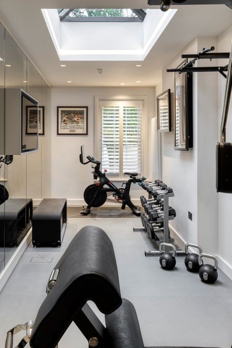 We all aspire to a home gym   In designing this one LLIDesign created a space that inspired the clients to want to work out    We ensured that the space was flooded with natural light from the skylight,     We mirrored all along one wall with an inset TV for on line classes ensuring that all  equipment was in the right positions to view the TV   Sporting memorabilia adds a personal touch - important as so many gyms seem impersonal   Click for more inspiration Joinery Design, London Interior, Home Gym Design, Home Automation System, Gym Design, Studio Interior, North London, Architectural Features, Bespoke Furniture