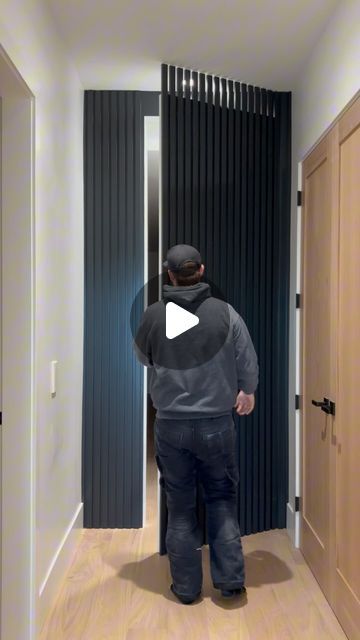 Justin Neufeld on Instagram: "Another day, another hidden door ☑️  As always, Sugatsune hinges swinging a door that weighs hundreds of pounds effortlessly. #hiddendoor #sugatsune #notsponsoredjustloveit #construction #carpentry #carpenter #slats #slatwall" Door Cladding Interiors, Hidden Slat Wall Door, Hidden Slat Door, Slat Wall Hidden Door, Hidden Door Wall Panelling, Slatwall Ideas Home, Panel Hidden Door, Hidden Panel Door, Door Makeover Ideas