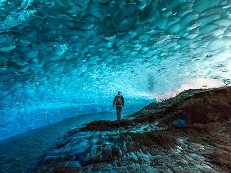 Mendenhall Ice Caves: Juneau, Alaska The ice caves inside Juneau’s Mendenhall Glacier are not easily accessible nor for the faint of heart—those who want to see them in person must first kayak to the glacier and then ice-climb to reach it. But once adventurers stand under the glowing blue ceilings of ice, we’re pretty sure they’ll tell you it’s worth the trek. Glacier Cave, Mendenhall Ice Caves, Beautiful Places In America, Uyuni Bolivia, Ice Caves, Socotra, Juneau Alaska, Honeymoon Places, Places In America