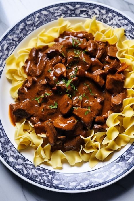 The Coziest, Creamiest Beef Tips with Egg Noodles - Delicious Dinner Beef Tips With Egg Noodles, Beef Tips And Noodles, Slow Cooker Appetizers, Homemade Egg Noodles, Types Of Noodles, Sirloin Tips, Cranberry Cheese, Buttered Noodles, Beef Tips