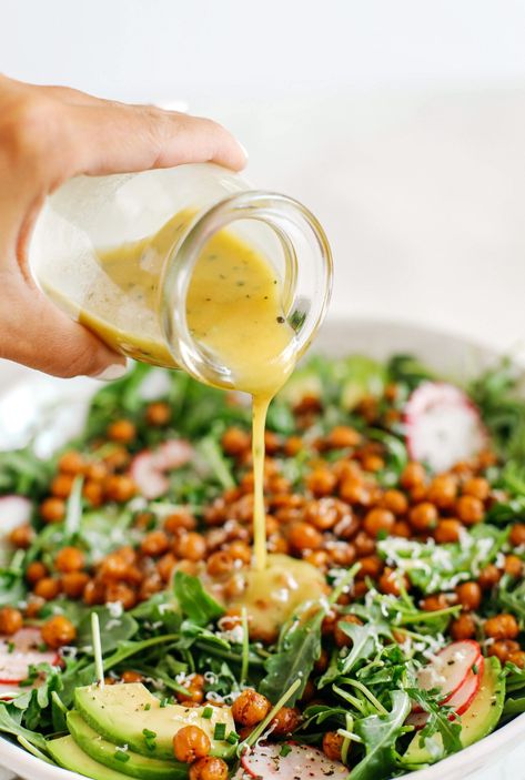 The most delicious Arugula Salad with Honey Roasted Chickpeas that are sweet, savory and perfectly crunchy!  Top with fresh veggies, avocado slices and my lemon dijon herb dressing! Honey Roasted Chickpeas, Herb Dressing Recipe, Herb Dressing, Crunchy Chickpeas, Arugula Salad, Honey Roasted, Roasted Chickpeas, Chickpea Salad, Fresh Veggies