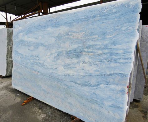 Calcite Blue Slab Now IN STOCK. Have a look at website or visit one of our showrooms in Staten Island, NY or Colts Neck, NJ. #Quartz #Quartzite #Marble #Granite #Onyx #Kitchen #Countertop #Apmarble #Kitchenidea #Kitchendesign #Kitcheninspiration Blue Quartz Countertop Kitchen, Blue Cabinets Tan Counters, White And Blue Marble Countertops, Blue Dunes Leather Granite Countertops Kitchen, Quartz Countertops With Blue Veins, Turquoise Quartz Countertops, Coastal Granite Countertops, Blue Marble Kitchen Countertops, Light Blue Countertops