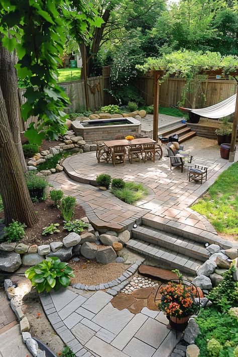 Beautiful backyard makeover featuring a stone patio, outdoor dining area, hammock, garden beds, lush greenery, and serene landscaping ideas. Oasis Garden, Big Porch, Affordable Backyard Ideas, Ideas For Small Yards, Quiet Minimal, Backyard Ideas For Small Yards, Diy Outdoor Lighting, Fire Pit Landscaping, Backyard Patio Ideas