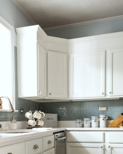 How To Install Crown Molding On Kitchen Cabinets | Crown molding can give your cabinets an extra air of charm and sophistication. | Kitchen Cabinet Kings Crown Moulding Kitchen Cabinets, Kitchen Trim, Painting A Sink, Trim Inspiration, Install Crown Molding, Kitchen Cabinet Molding, Cheap Backsplash, Crown Molding Kitchen, Kitchen Cabinet Crown Molding