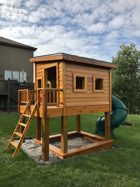 Custom playhouse with sandbox, roof hatch, cedar siding and prefab slide. Simple Play House Outdoor, Diy Outdoor Tree, Outdoor Tree House, Sandbox Diy, Play House Plans Diy Outdoor Playhouses, Kids Wooden House, Simple Wood Playhouse, Diy Wooden Fort Playhouse Plans, Diy Playhouse Plans