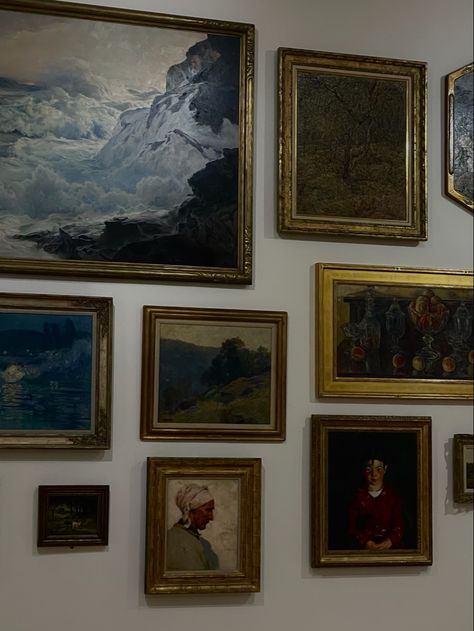 different sized and colored paintings fill a blank white wall. the paintings range from ocean waves crashing onto rocks to an old overworked woman. Blue Academia Aesthetic, Paradis Sombre, Blue Academia, Ravenclaw Aesthetic, Hogwarts Aesthetic, Aesthetic Light, Harry Potter Aesthetic, Hogwarts Houses, Dark Academia Aesthetic