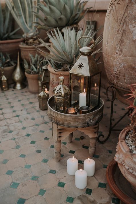 This couple got engaged on a rooftop in Marrakech. Surrounded by beautiful decor and candlelight, he proposed to his girlfriend. With our help, this was a magical engagement. We made sure everything was perfectly set up and they had an amazing night. If you want to know what we can do for you? Click here and send us an email! Engagement Party Table, Arabian Nights Party, Egyptian Party, Engagement Decoration, Moroccan Nights, Moroccan Theme, Henna Night, Dubai Wedding, Arab Wedding