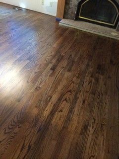 We just had our red oak floors stained with Minwax Jacobean. I am at a complete loss as to what color to paint the walls and trim (FYI the fireplace and trim pictured will be replaced). Anyone have Jacobean stained red oak that can share some paint colors that compliment it? Suggestions please! Than... Hardwood Floor Stain Colors, Oak Floor Stains, Floor Stain Colors, Wood Floor Stain Colors, Red Oak Hardwood Floors, Wood Floor Colors, Jacobean Stain, Red Oak Floors, Red Oak Hardwood