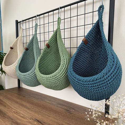 "These hanging wall baskets are ideal for rustic kitchen decoration. You can save space in your kitchen with hanging storage baskets. It is the perfect solution for storing your fruits and vegetables. It is made of polypropylene yarn. These baskets do not contain chemicals harmful to health. Extremely durable baskets are also decorative. You can use it not only in the kitchen but everywhere in your home. You can organize your supplies in the bathroom, basement, pantry and more. You can also use Hanging Fruit Baskets Kitchen, Hanging Vegetable Basket Kitchen, Kitchen Wall Baskets, Stairway Organization, Yarn Wall Storage, Hanging Vegetable Basket, Shelves On The Wall, Basement Pantry, Hanging Storage Baskets