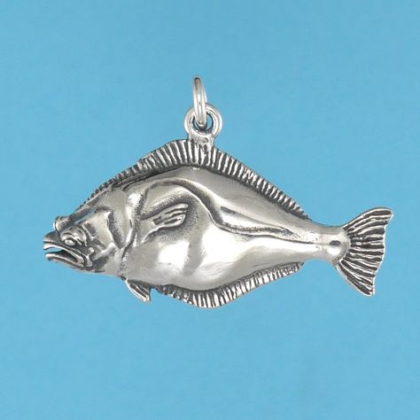 DESCRIPTION Our sterling silver flounder charm is a faithful recreation of these strange demersal fish! There are several species of flounder, all marked by their migrating eyes. They begin life as a hatchling with an eye on both sides of their head, one of which journeys to join the other, leaving them with two eyes on one side of their body. These sly predators disguise themselves on the sea floor and ambush their prey as they swim casually by. Gift this charm to the avid angler in your life! Two Eyes, Silver Metal Clay, Sea Floor, Manic Pixie Dream Girl, String Bean, Fish Knife, Fish Shapes, Cute Purses, Jewelry Inspo