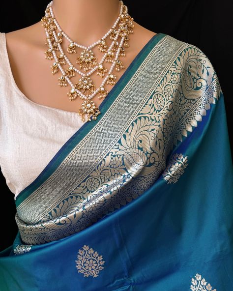 Peacock blue Art silk saree with contrast golden zari border and design all over saree. Comes with running blouse. Find this saree in our website: Www.thejacouture.in > silk sarees> peacock blue art silk saree. #silksarees #peacockbluesaree #artsilk #sareeslove #silk Peacock Blue Saree Contrast Blouse, Blue Saree Contrast Blouse, Peacock Blue Saree, Peacock Saree, Saree Contrast Blouse, Blouse Designs Indian, Dress Idea, Blue Saree, Art Silk Sarees