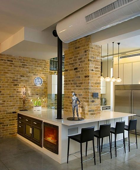 Exposed brick Brick Kitchen Wall, Exposed Brick Kitchen, Modern Industrial Kitchen, Sliding Room Dividers, Brick Chimney, Brick Kitchen, Industrial Livingroom, Industrial Interior Design, Industrial Interiors