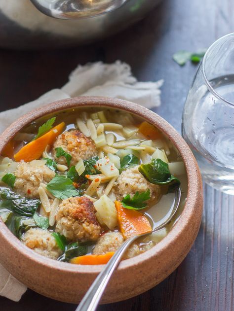 Cannellini bean meatballs, tender spinach, fennel, and orzo pasta go into this cozy vegan Italian wedding soup. Bean Meatballs, Italian Soup Recipes, Cannellini Bean, Plant Based Soups, Vegetarian Italian, Meatball Soup, Wedding Soup, Vegan Italian, Italian Soup