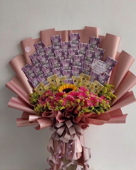 Today's surprise 😍 Happy 7th Anniversary, sir John Alan and ma'am Renagene! 🫶❤️🫶 Thank you so much, sir John Alan, for making us a part of your celebration. 🎉 🥰 ✅ Money Bouquet with 1pc Sunflower and 1 Dozen Gerbera (w/ 7K money) #MoneyBouquet #HappyAnniversary #SurpriseCebu #Cebu #CebuSurprise #SMNC #SurpriseMeNowCebu Bouquet Money Flower, Money And Flower Bouquet, Flower Bouquet With Money, Money Bouquet Ideas, Snacks Bouquet, Money Flower Bouquet, Happy 7th Anniversary, Gifts Bouquet, Gift Card Bouquet