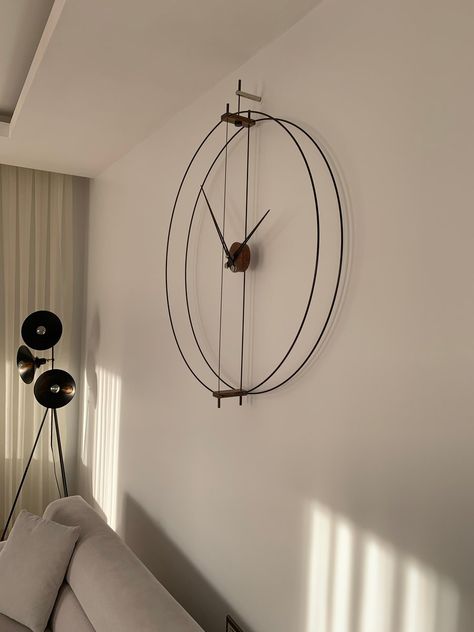 Statement Wall Clock, Wall Watch Design, Wall Clock Decor Ideas, Wall Clock Decor Living Room, Wall Watches, Clock Decor Ideas, Silver Wall Clock, Watch Wall, Big Wall Clocks