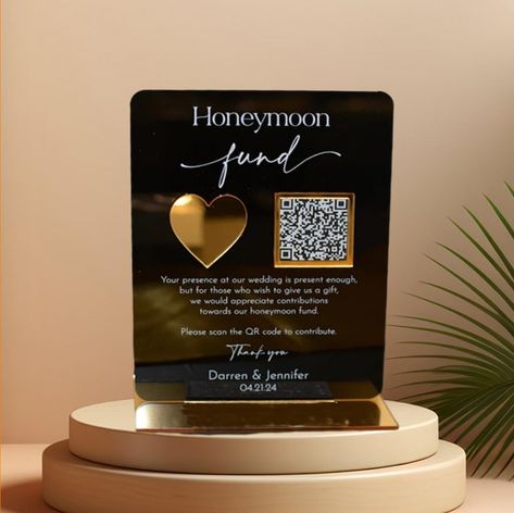 PRICES MAY VARY. Personalized Design: This modern and minimalist wedding acrylic sign features a golden mirror effect and a custom scannable QR code. You can customize the text with the names of the bride and groom, as well as the wedding date and any other details you wish to include. The sign is perfect for displaying at the wedding reception, on the honeymoon, or in the couple's new home. High-Quality Materials: The sign is made from high-quality acrylic material, which is durable, lightweigh Non Traditional Guest Book Wedding, Wedding Circuit Ideas, Micro Wedding Reception, Acrylic Table Signs, Honeymoon Fund Sign, Modern Wedding Signs, Mirror Wedding Signs, Bridal Era, Wedding Qr Code