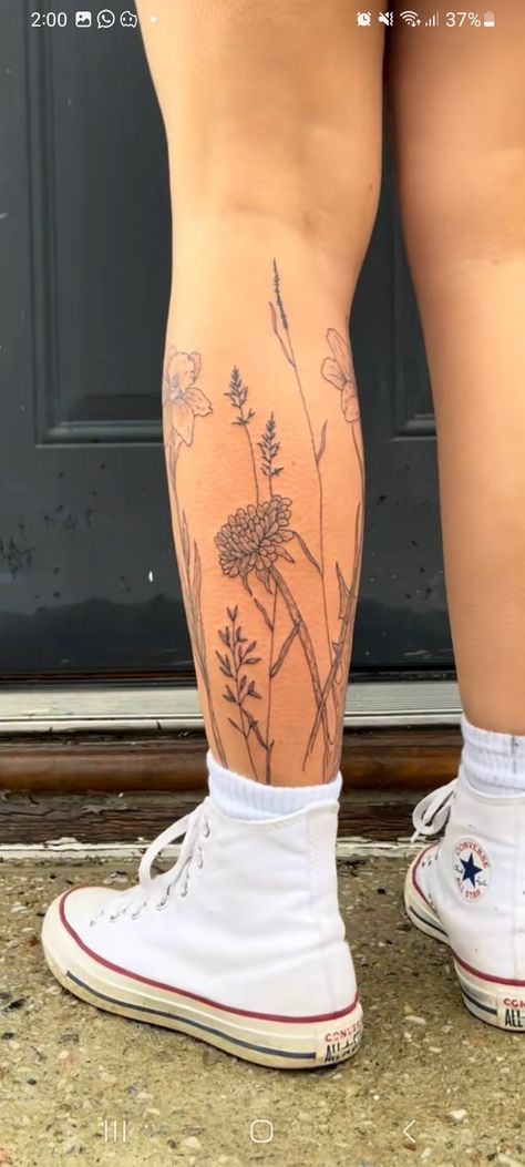 Flower Going Up Leg Tattoo, Flower Tattoo On Shin, Flowers Calf Tattoo, Flower Around Ankle Tattoo, Flowers Wrapped Around Ankle Tattoo, Girly Thigh Tattoos Women, Wildflower Tattoo Lower Leg, Flower Wrap Leg Tattoo, Flowers Around Leg Tattoo