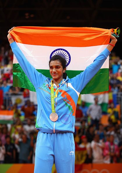 Silver medalist V Sindhu Pusarla of India celebrates during the medal ceremony… P V Sindhu, Olympic Winners, Pv Sindhu, Happy Woman Day, Rio Olympics 2016, Olympic Medals, Rio Olympics, Indian Woman, Sport Player